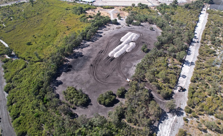Sand piles stored in dry lake