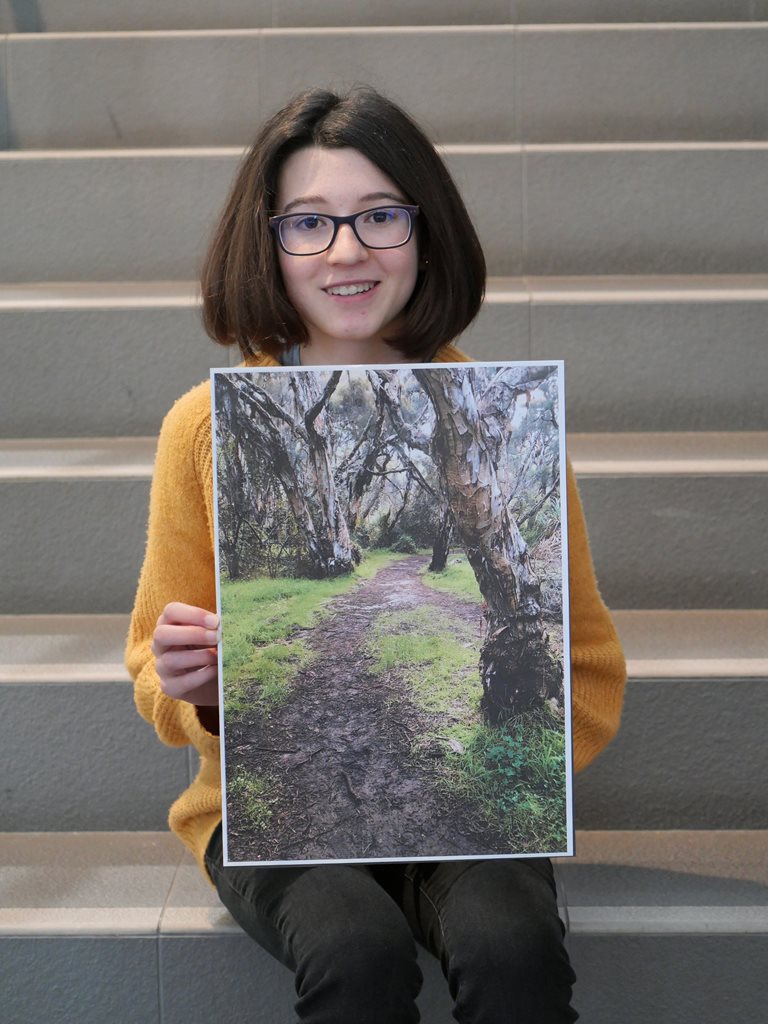 Youth category winner of the 2022 Photo competition Sienna-Rose Micallef holding her winning photo