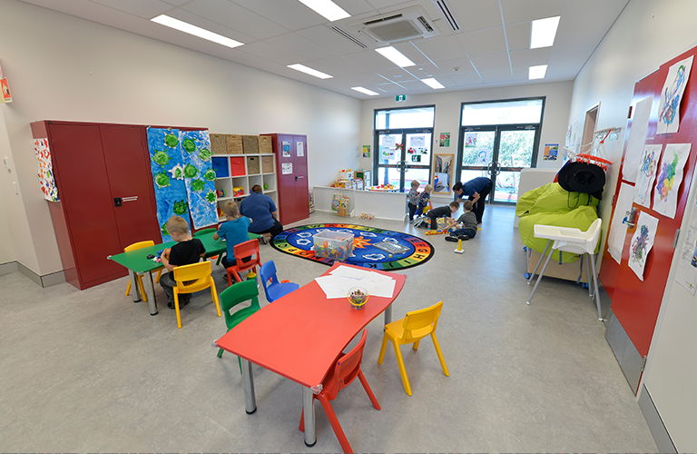 The Pixie Pops Creche at John Wellard Community Centre, with coloured drawings on the walls.