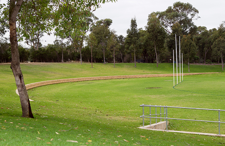 An image of Wellard Oval, with a glimpse of the football goals.