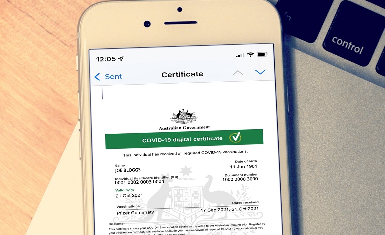 An image of a COVID-19 digital certificate on a phone.